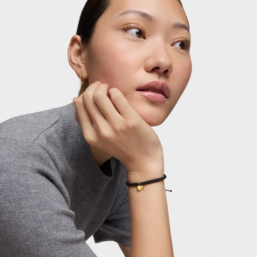 Pulsera de oro 14 kt doble corazón y nylon negro TOUS Flechazo