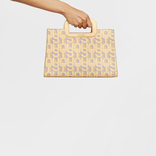 حقيبة تسوُّق Amaya متوسطة الحجم باللون الكريمي من تشكيلة TOUS MANIFESTO
