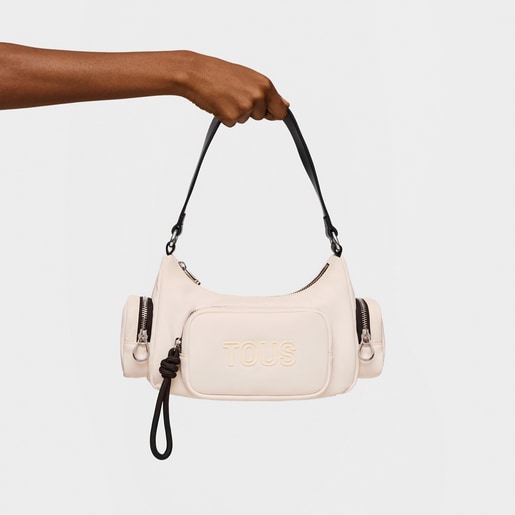 ベージュのショルダーバッグ TOUS Roomy