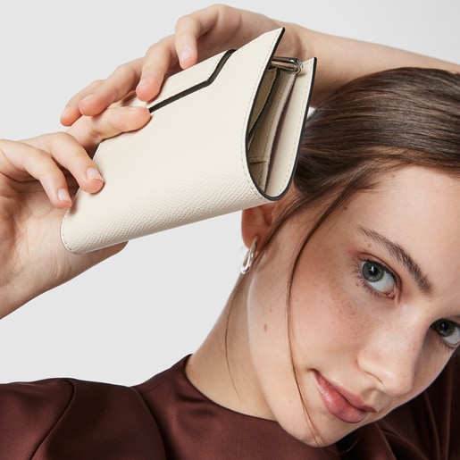 ベージュのスモールポケットウォレット TOUS Funny