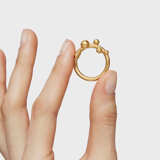 Large Ring with 18kt gold plating over silver and details Hold