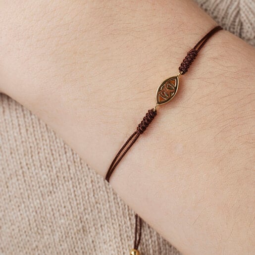 Браслет TOUS Good Vibes с золотым глазом на коричневом шнурке