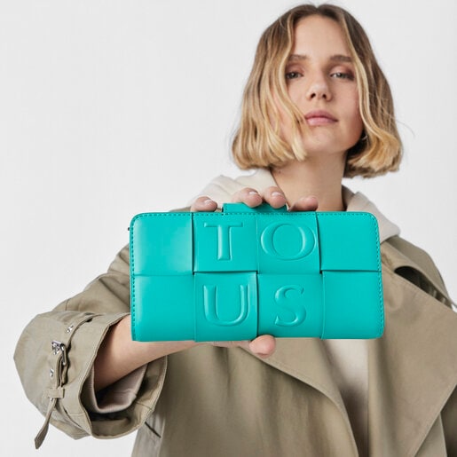 ターコイズ＆ブラウンのミディアムウォレット TOUS Damas