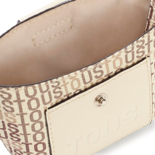 ベージュのショッピングバッグ入りミニ・ペンダントトップ TOUS Cecilia