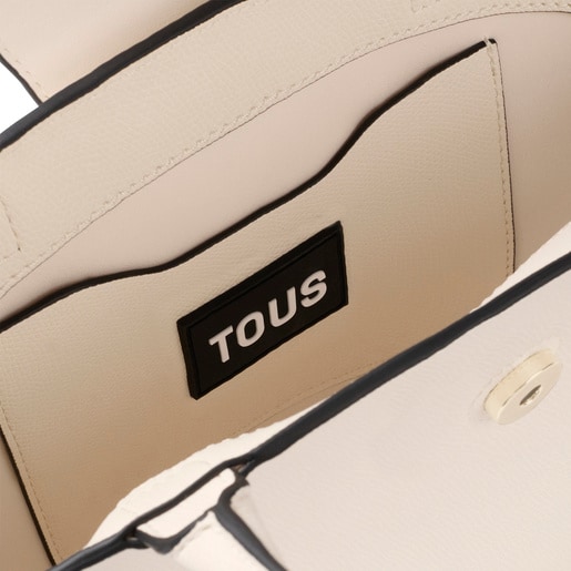حقيبة أحمال خفيفة صغيرة الحجم باللون البيج من تشكيلة TOUS Lucia