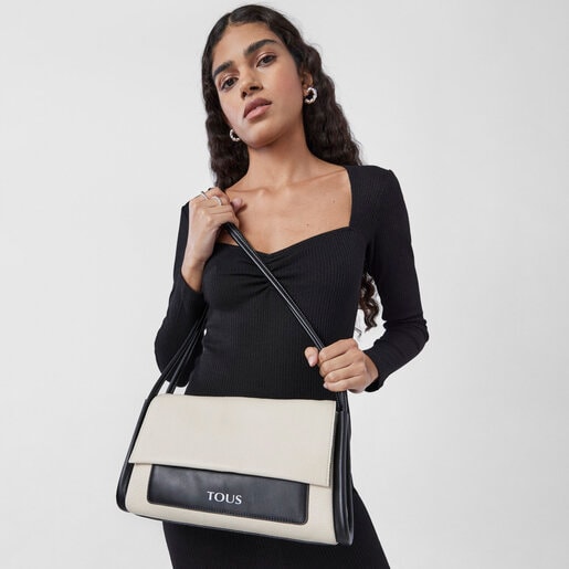 Bandolera mediana de piel beige y negra TOUS Empire