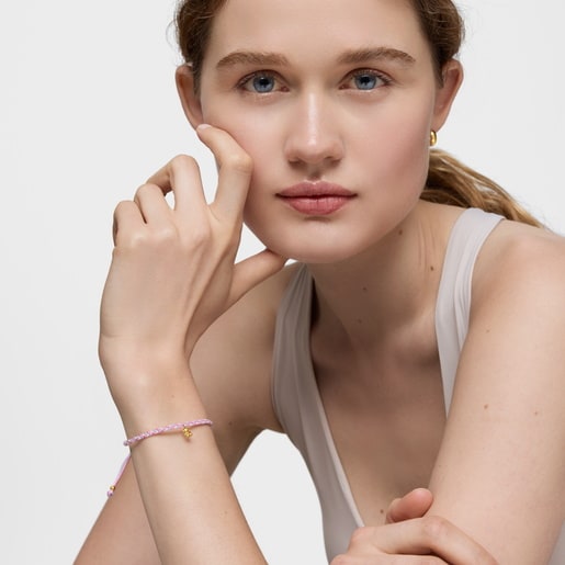 Pulsera oso con baño de oro 18 kt sobre plata y nylon rosa/blanco TOUS Motivos