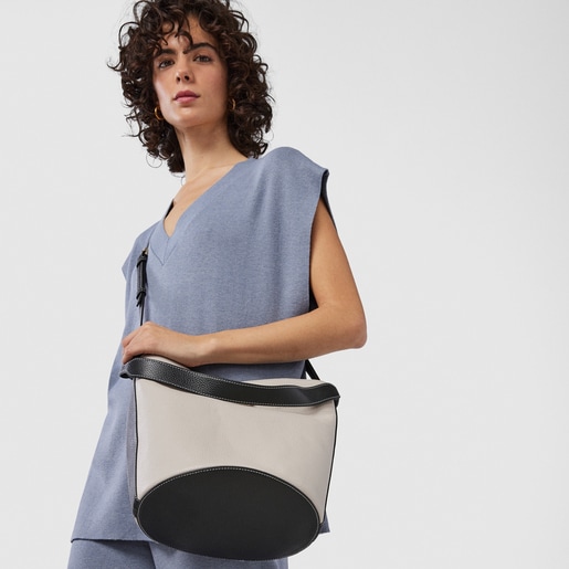 Бежево-черная кожаная сумка-бакет TOUS Legacy среднего размера