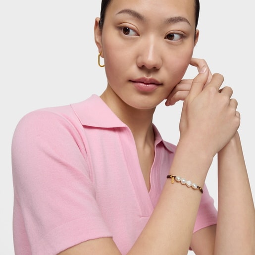 צמיד פנינים בשילוב תליון דובי וחוט שחור