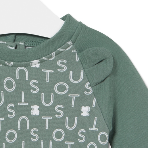 Baby playsuit in Soft green