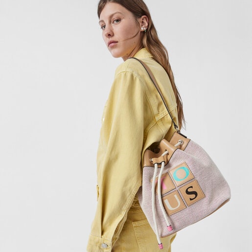 ピンクのバケツバッグ TOUS Yummy