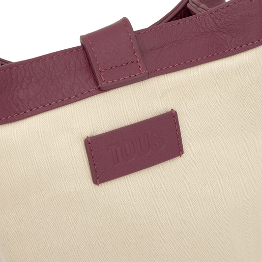 バーガンディーカラーのスマホショルダー TOUS Hold