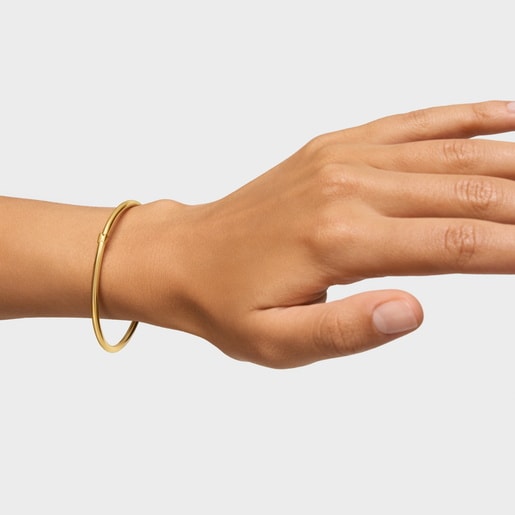 Bangle with 18kt gold plating over silver Hold