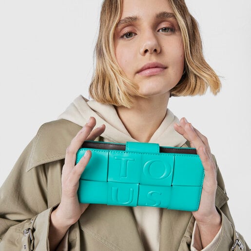 ターコイズ＆ブラウンのミディアムウォレット TOUS Damas