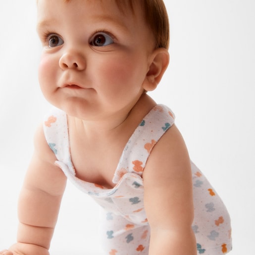 Baby romper with shoulder straps in Joy white
