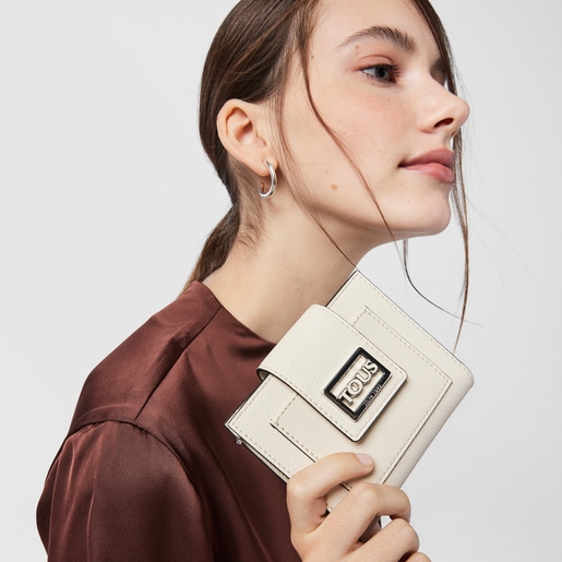 ベージュのスモールポケットウォレット TOUS Funny