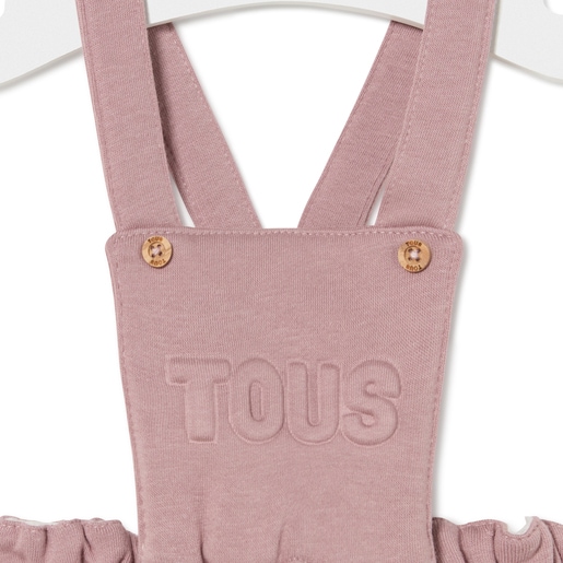 Dungarees-style baby romper in Classic pink