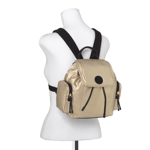 Small gold-colored Doromy backpack