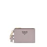 Mauve colored TOUS Pop Change purse-cardholder