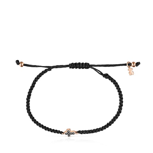 Pulsera cruz con baño de oro rosa 18 kt sobre plata, espinelas y cordón negro Motif